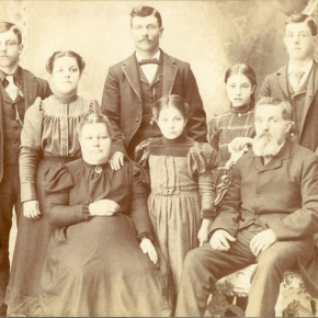 Old sepia tone photograph of Pioneer Families.